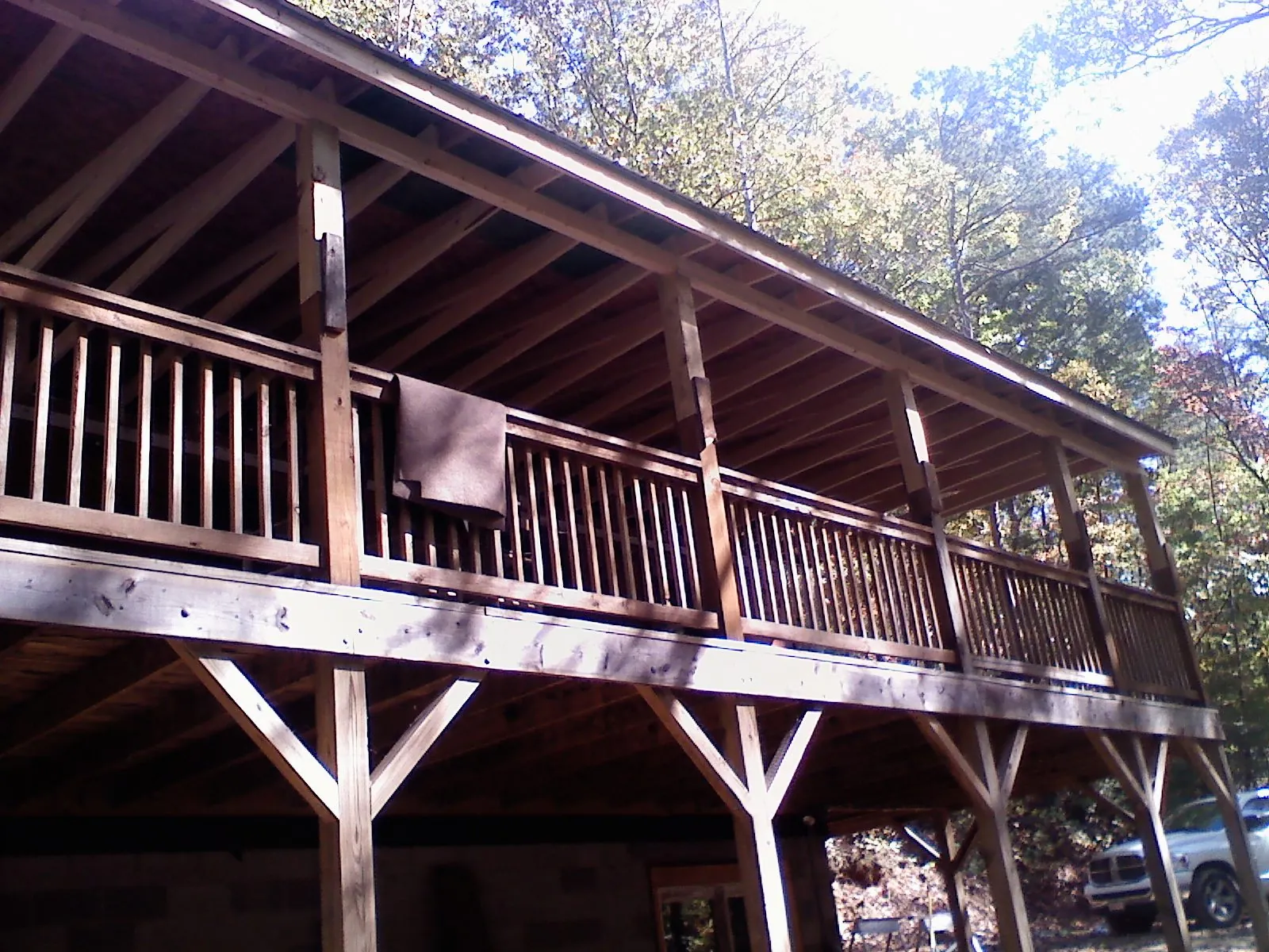 Timber framing under a new elevated porch and deck — Roof Leak Repair in New Albin by Roofing Brothers